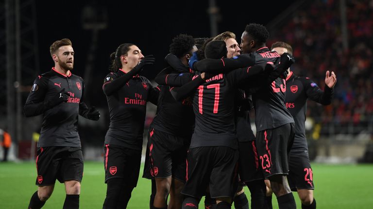 Arsenal players celebrate after scoring Monreal's opener against Ostersunds