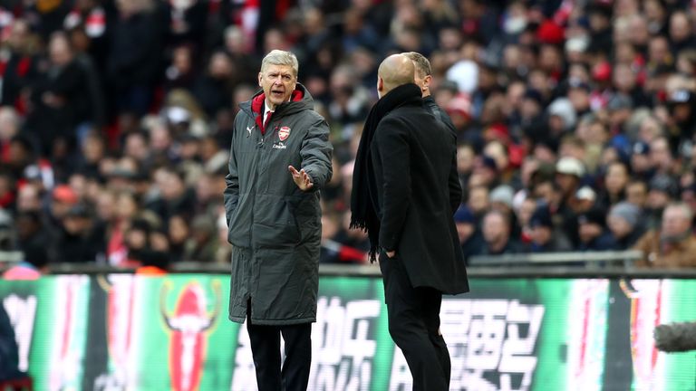 Arsene Wenger and Pep Guardiola exchange words during the Carabao Cup Final