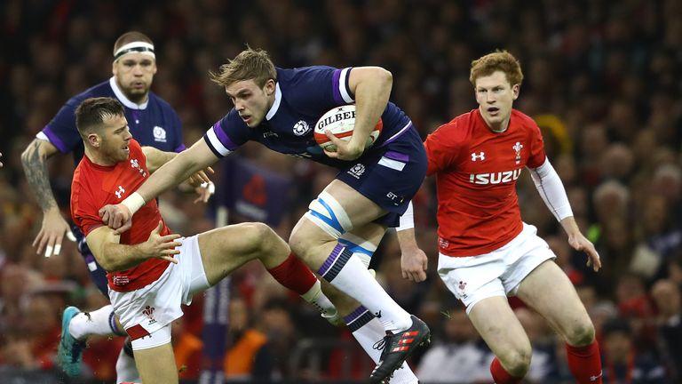 Jonny Gray looks to get past Gareth Davies