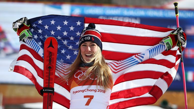 Gold medalist Mikaela Shiffrin of the United States poses on the podium after the Ladies' Giant Slalom