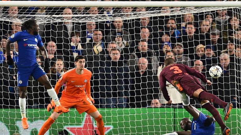 Thibaut Courtois in action against Barcelona