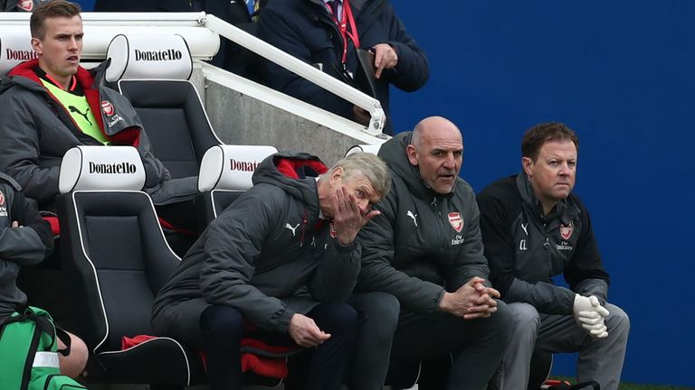 Arsene Wenger looks on as his side lose at Brighton