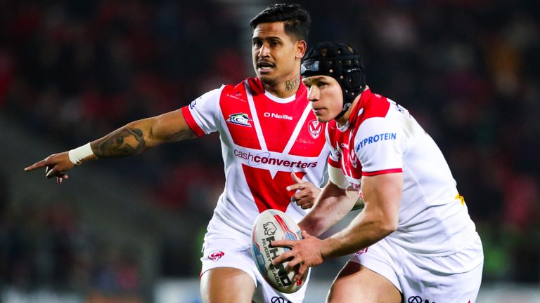 Ben Barba looks on while Jonny Lomax attacks for Saints