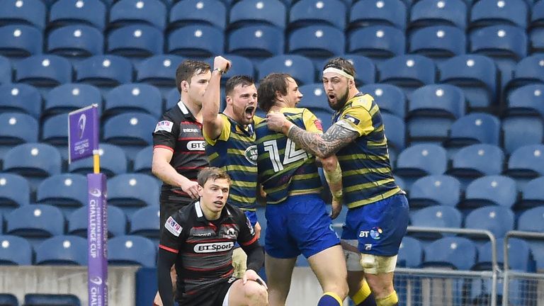 Blues players celebrate Blaine Scully's try after 30 minutes 