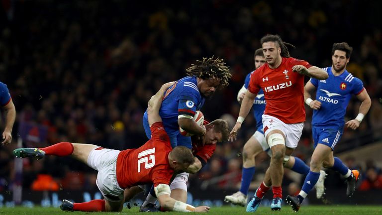 Dan Biggar  and Hadleigh Parkes bring down  Mathieu Bastareaud 