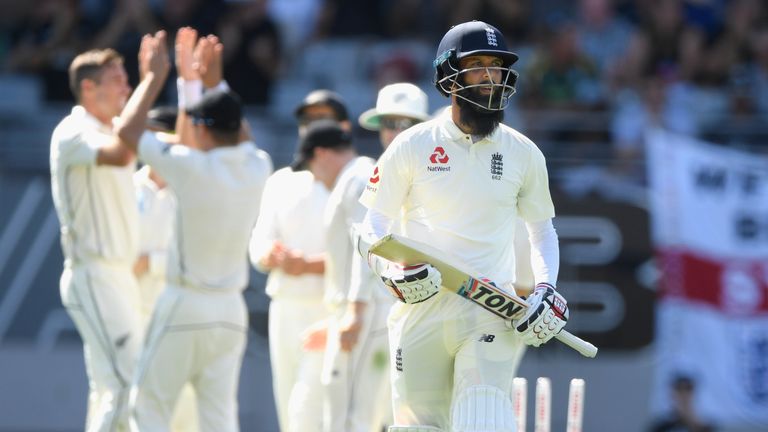 Moeen Ali walks off the field after being bowled by a Tim Southee full toss