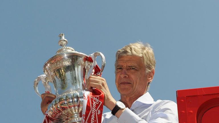 Arsene Wenger celebrates with the FA Cup