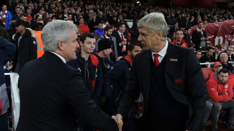 Mark Hughes says the criticism Arsene Wenger has received is unfair