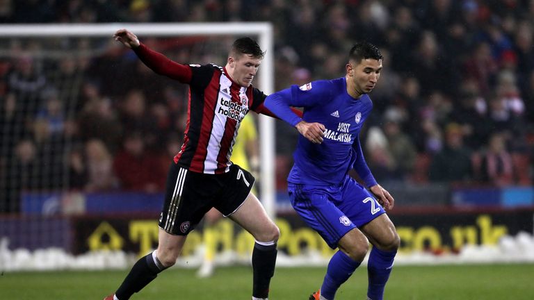 Sheffield United's John Lundstram (left) and Cardiff's Marko Grujic battle for the ball