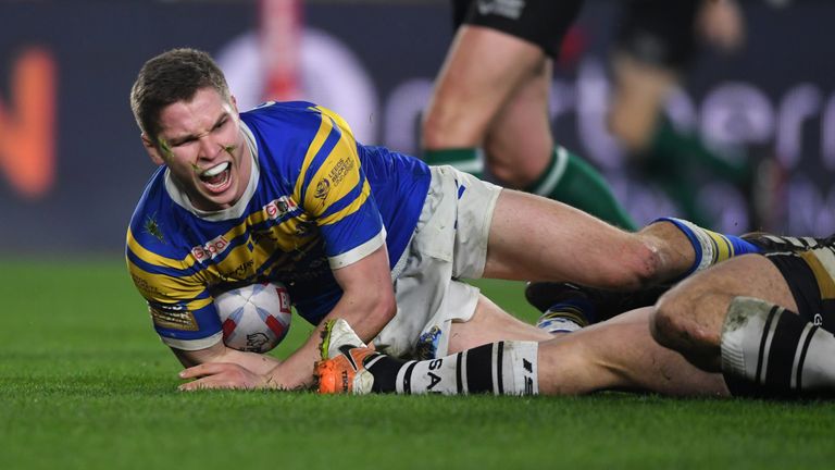 Matt Parcell celebrates after going over for Leeds - a penalty try was eventually awarded