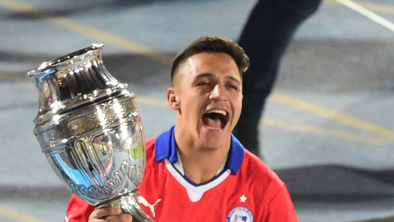 Sanchez celebrates winning the Copa America
