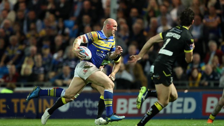 Carl Ablett powers away to score a try for Leeds against Warrington