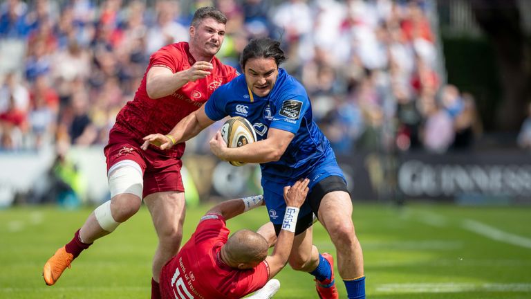 Man-of-the-match James Lowe looks to get past Munster's Sammy Arnold and Simon Zebo