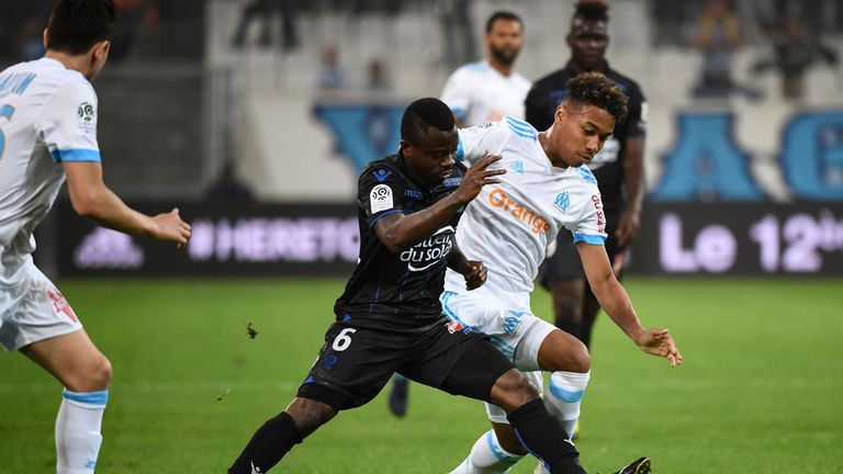 Seri tackles Boubacar Kamara of Marseille