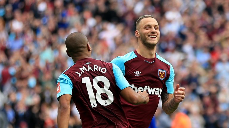 Marko Arnautovic celebrates his goal with Joao Mario