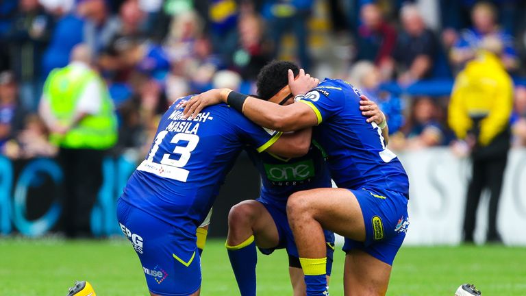 Warrington's Ben Murdoch-Masila, Tyrone Roberts and Sitaleki Akauola celebrate at the final whistle