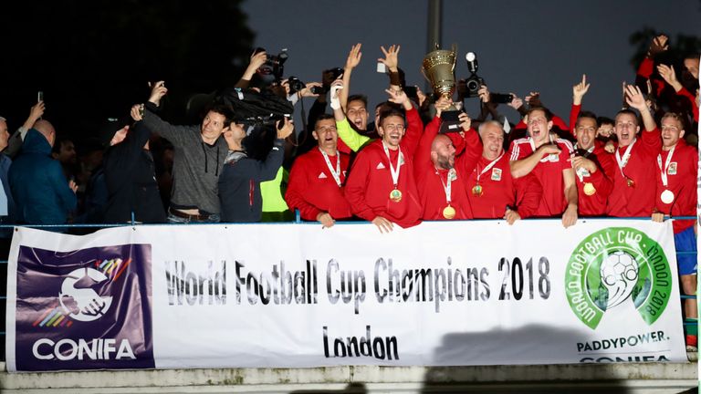 Karpatalya players celebrate with the trophy after victory over Northern Cyprus in the final of the CONIFA World Football Cup at Enfield (all images Con Chronis/CONIFA)