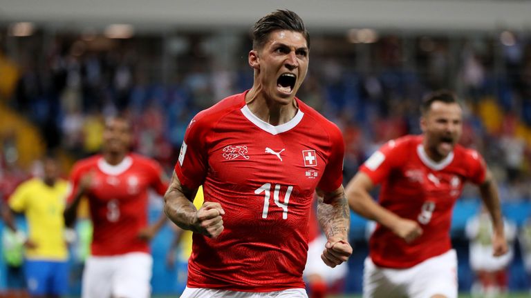 Steven Zuber celebrates after equalising for Switzerland