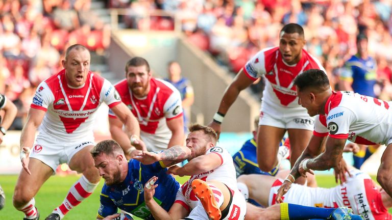 Daryl Clark touches down for Warrington in the first half