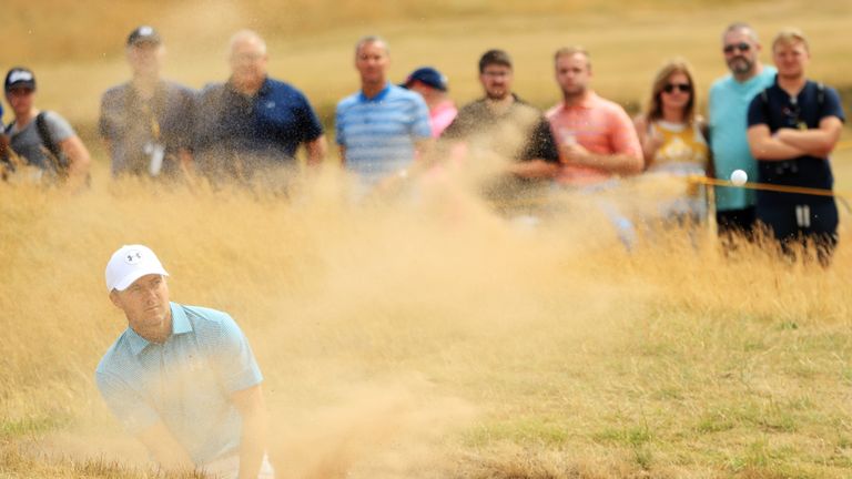 Jordan Spieth found bunker trouble on the 15th