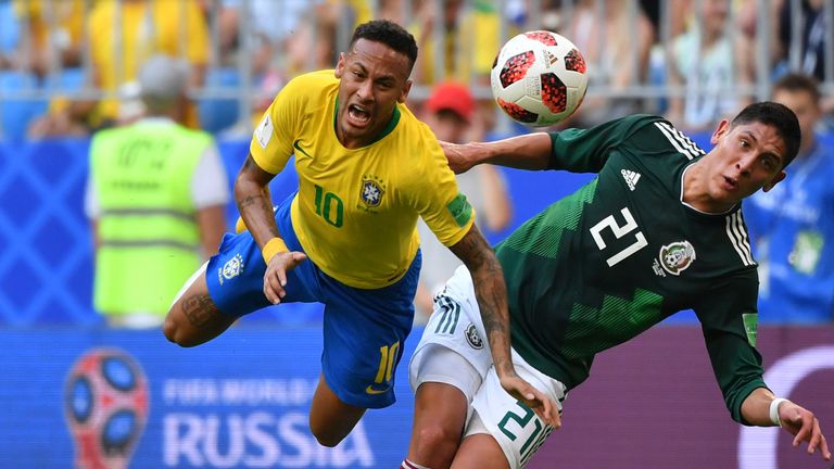 Neymar goes down after Edson Alvarez's tackle in last 16 game with Mexico