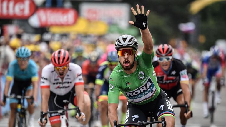 Peter Sagan celebrates as he crosses the line on stage 13