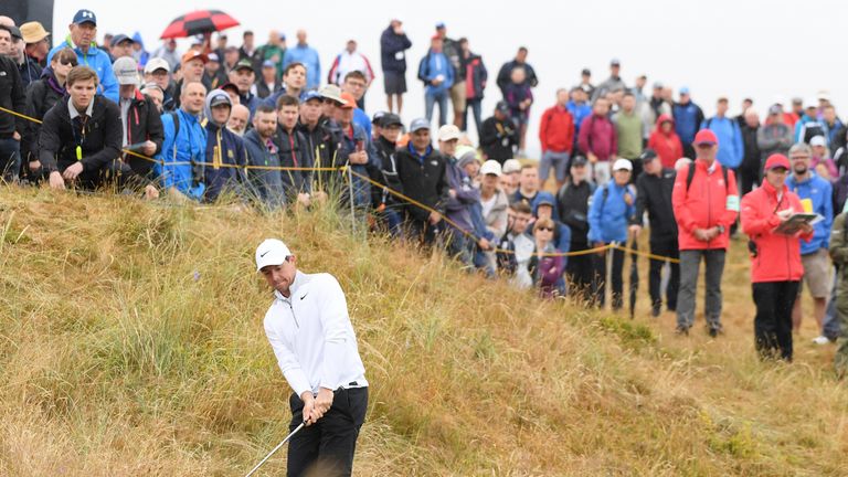 McIlroy battled hard to stay within two of the lead