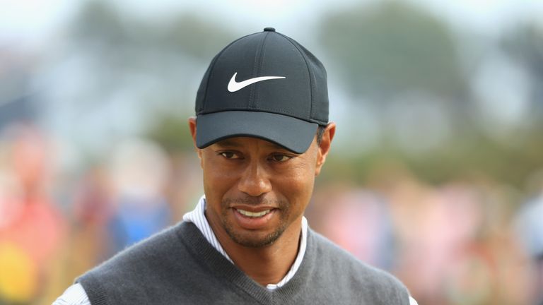 Woods was tied for the lead after his sixth birdie at the 14th