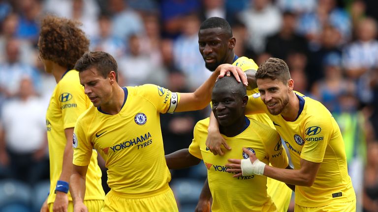 Kante is congratulated by Jorginho after scoring Chelsea's first goal against Huddersfield