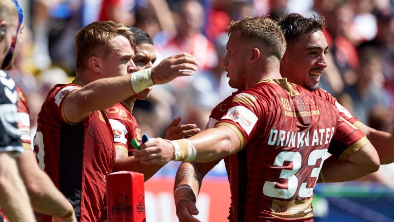 Lewis Tierney (left) was first to get over for Catalans in an outstanding first-half Dragons display 