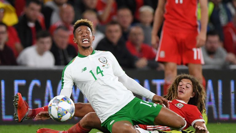 Ethan Ampadu makes a tackle on Callum Robinson