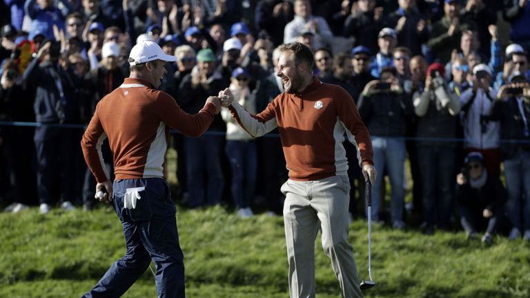 Tyrrell Hatton and Paul Casey celebrate victory in match two