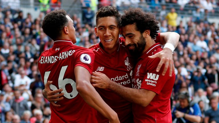 Robert Firmino celebrates after putting Liverpool 2-0 up