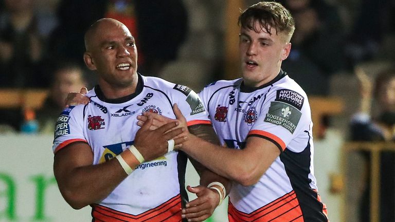 Castleford's Jake Webster is congratulated on a score by team-mate Jake Trueman