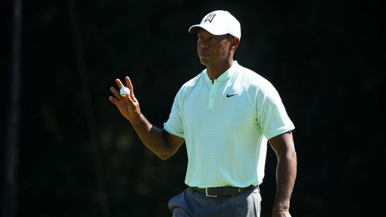 Tiger Woods shares the overnight lead with Rory McIlroy in Philadephia