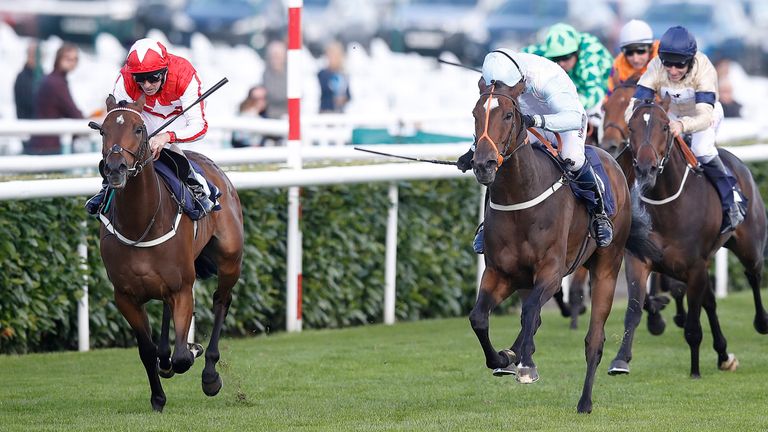 Central City (left) ridden by Ted Durcan wins the Clipper Logistics Leger Legends Classified Stakes
