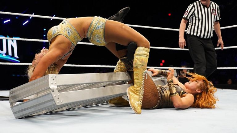 Charlotte Flair and Becky Lynch left nothing behind in their brutal match at Evolution, WWE's first all-women's pay-per-view event