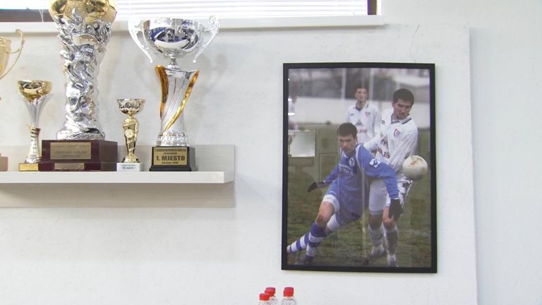Photographs of a young Dzeko in the media room of the Grbavica Stadium
