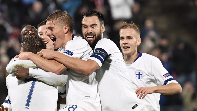 Finland celebrate their second goal against Greece