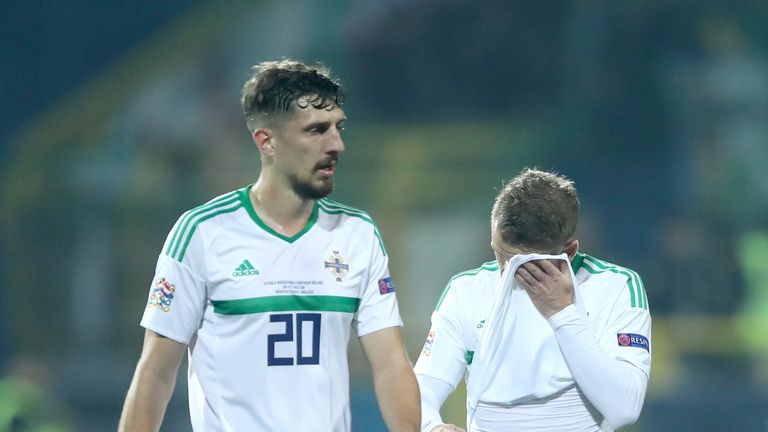 Craig Cathcart (left) and Steven Davis react to Bosnia taking the lead