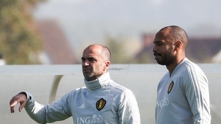 Martinez brought in Thierry Henry (right) as his Belgium assistant