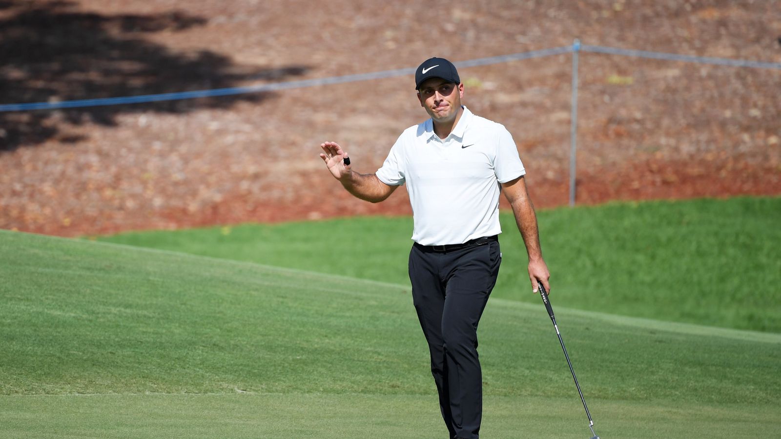 Francesco Molinari chips in for par after duff at DP World in Dubai ...