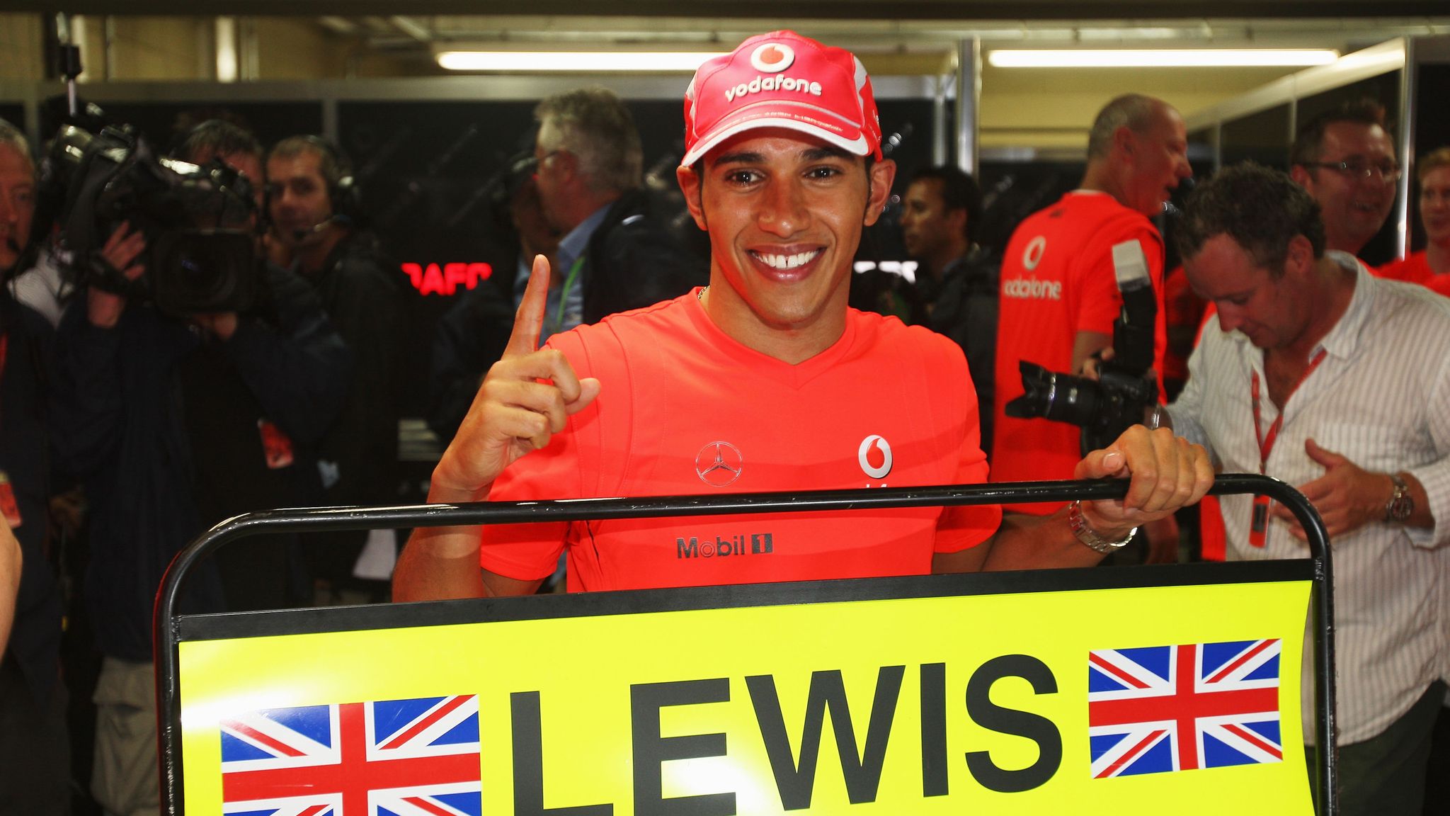 F1 fans ask 'is he single' as Lewis Hamilton rocks up at Brazilian