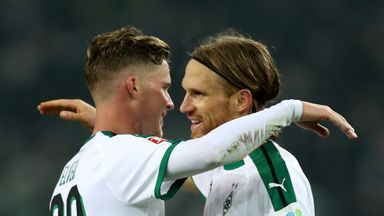 Michael Lang (R) celebrates with team-mate Thorgan Hazard after Borussia Monchengladbach's win
