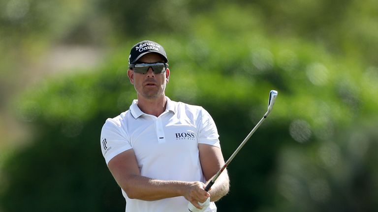 Henrik Stenson shares the halfway lead with Rahm