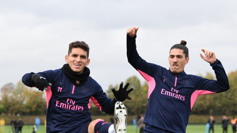Lucas Torreira and Hector Bellerin play up to the camera during a training session at London Colney