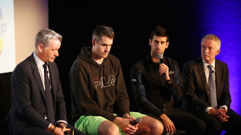 Djokovic sits alongside ATP executive chairman and president Chris Kemode (left), John Isner and far right Craig Tiley CEO of Tennis Australia