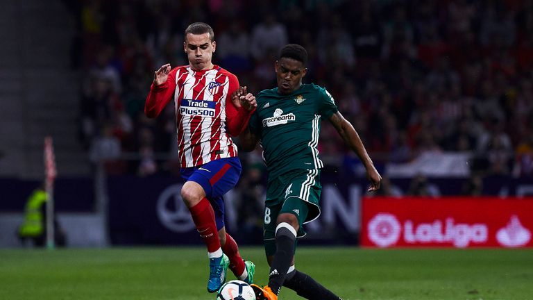 Firpo battles for the ball with Antoine Griezmann