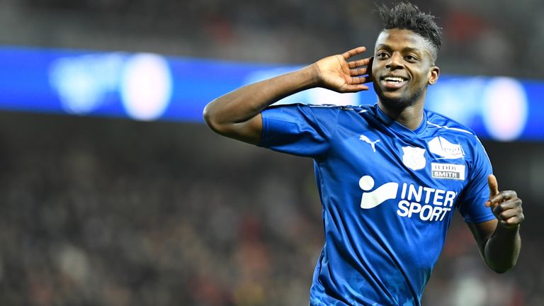 Amiens midfielder Eddy Gnahore celebrates