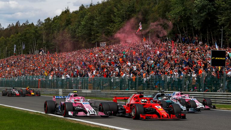 Just a month after the team entered administration, both cars of the re-born Racing Point Force India outfit challenge for the lead of the Belgian GP. Picture by Manuel Goria, Sutton Images.